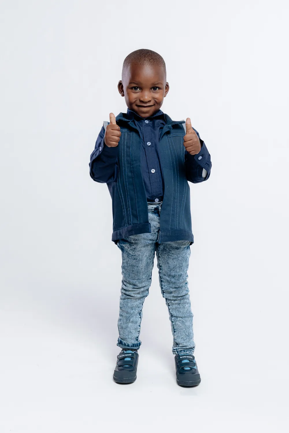 Child in a denim jacket