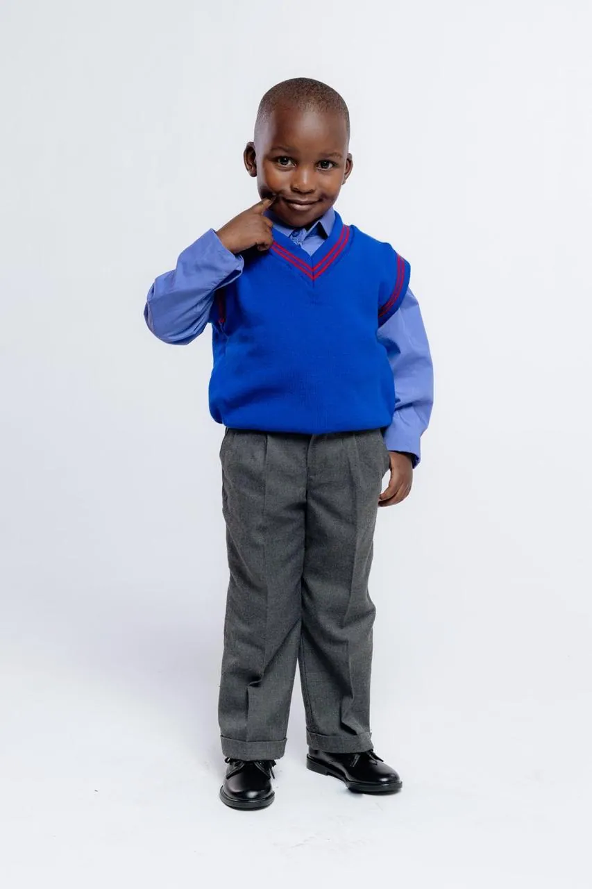 Learner in a full school uniform